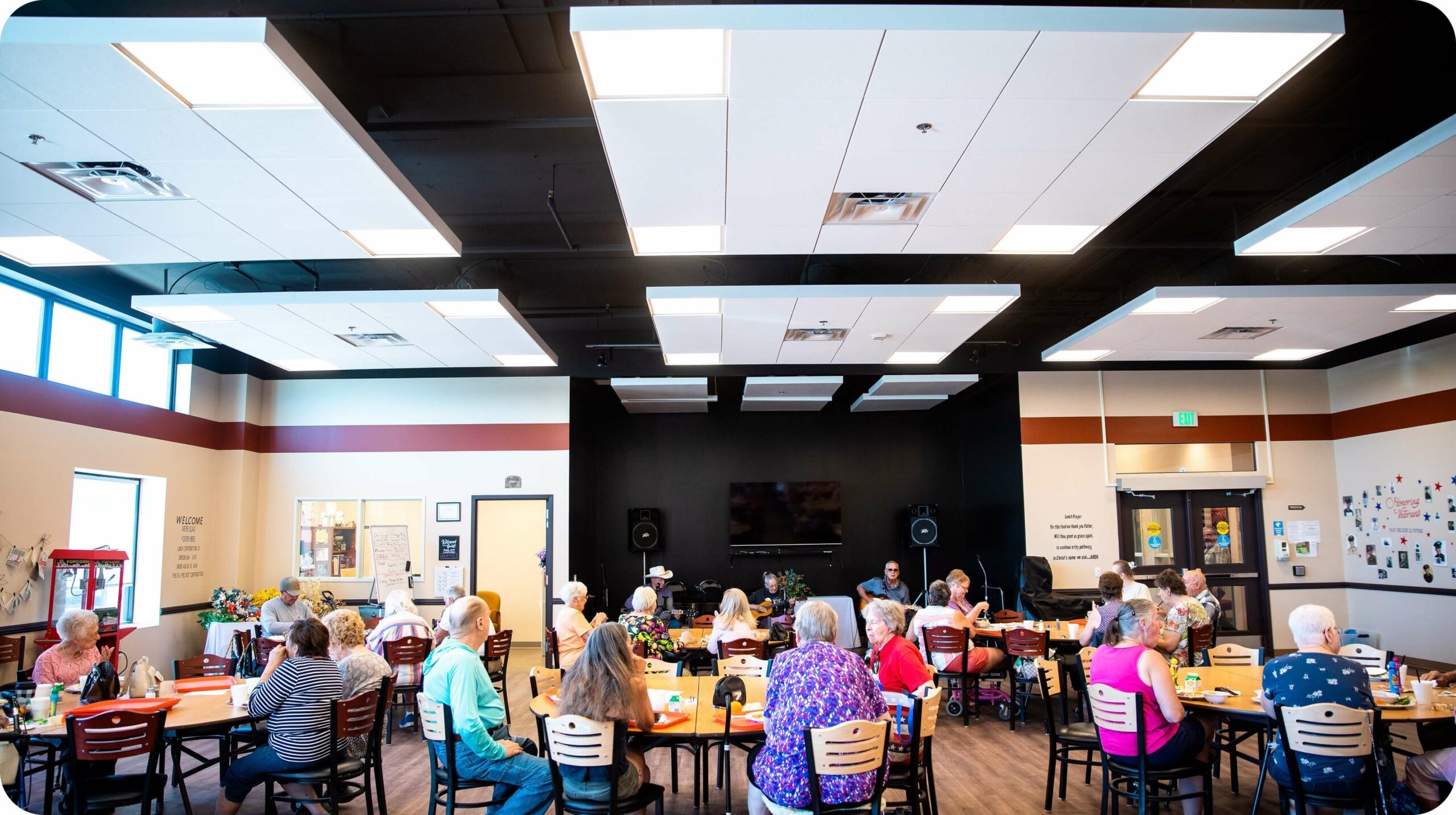 Image of adult seniors sitting together in a auditorium