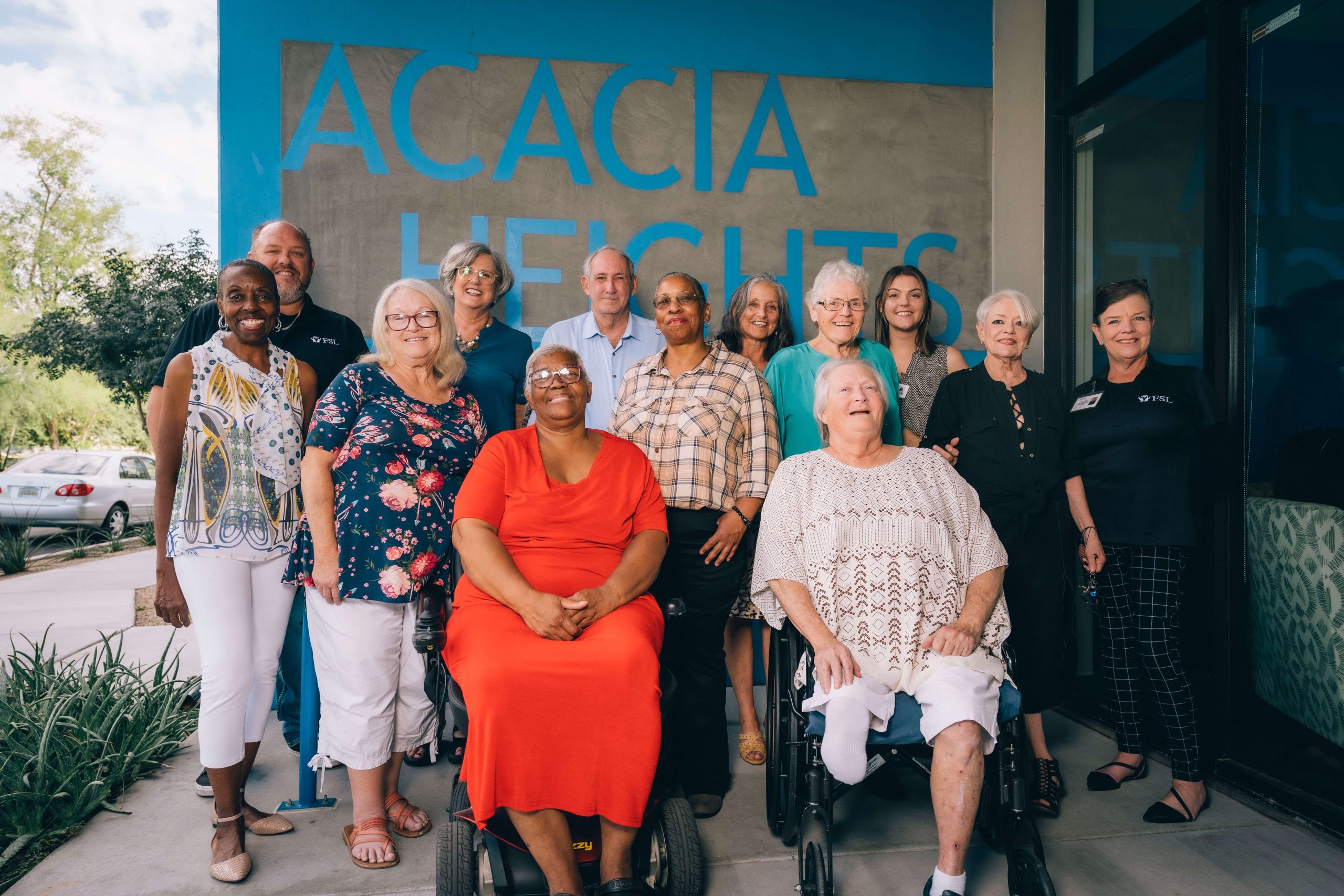 A group of staff posing for a group photo